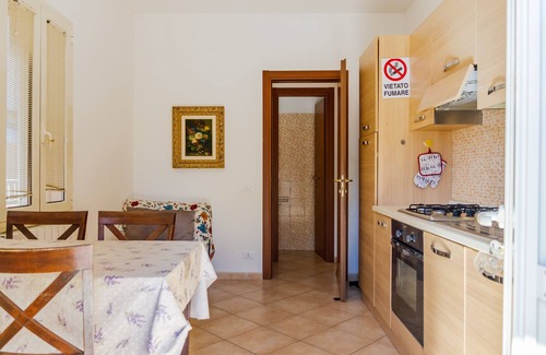 Follonica Appartement | Appartement de vacances "Acqua" avec vue sur mer et jardin privé