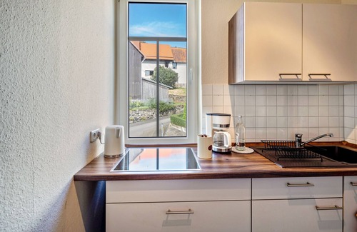 Michelbach Appartement | Appartement de vacances "Bachmanns" avec vue sur les montagnes, jardin partagé et Wi-Fi