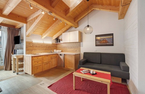 La Villa Appartement | Appartement de vacances 'Ciasa Irene Mansarde' près des pistes de ski avec vue sur les montagnes