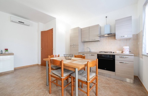 Masainas Appartement | Holiday Apartment "Is Lais 3" with Sea View, Shared Garden & Wi-Fi
