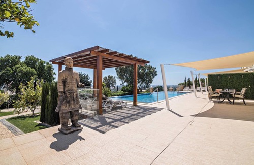 Cerro do Mocho Appartement | Appartement Mel de Flor avec vue sur la mer, piscine à débordement partagée, jardin partagé et Wi-Fi