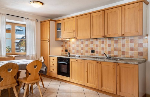 San Giovanni di Fassa Maison | Holiday Home 'Casa Titol Ami' with Mountain View, Balcony and Wi-Fi
