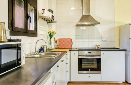 Torroella de Montgri Appartement | Maison de vacances 'Castell del Montgrí Baix' avec vue sur les montagnes et Wi-Fi.
