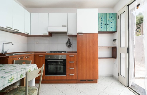 San Giovanni Maison | Maison de vacances 'Monolocale San Giovanni Posada' avec terrasse privée
