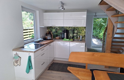 Guestrow Maison | Holiday Home 'Am Wasser, Bootshaus' with Private Terrace