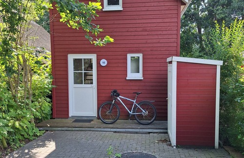 Guestrow Maison | Holiday Home 'Am Wasser, Bootshaus' with Private Terrace