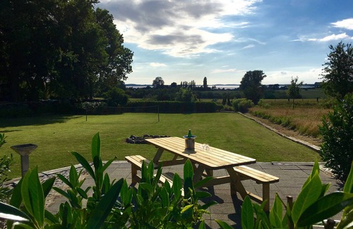 Glowe Appartement | Maison de vacances Boddenhus - WLAN, 2 chambres, Jardin - au bord de l’eau - maison de vacances