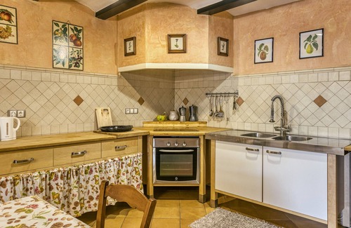 Orriols Maison | Maison de vacances 'Ca La Maria' avec vue sur les montagnes, terrasse privée et Wi-Fi.