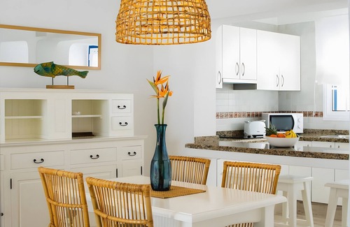 Arrieta Maison | Holiday Home 'Caleta Campos Bungalows' with Sea View, Shared Pool and Wi-Fi