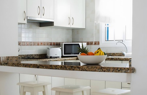 Arrieta Maison | Holiday Home 'Caleta Campos Bungalows' with Sea View, Shared Pool and Wi-Fi