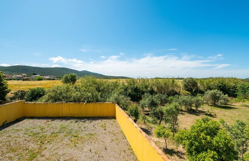 Giba Maison | Maison de vacances "Domus Luna" avec vue sur le lac, terrasse et climatisation.