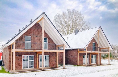 Krummin Maison | Maison de vacances "Ferienhaus Familienkoje Rike" avec jardin privé, sauna privé et Wi-Fi