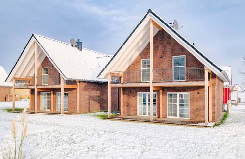 Krummin Maison | Maison de vacances "Ferienhaus Familienkoje Hannah" avec terrasse privée, sauna privé et Wi-Fi