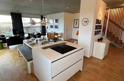 Neuharlingersiel Maison | Maison de vacances 'Großzügiges Modernes' avec terrasse partagée, jardin privé et Wi-Fi