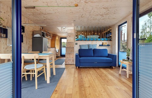 Neuland Maison | Maison de vacances 'Hochwertiges Hausboot Ahoi, Kamin' avec terrasse privée et Wi-Fi