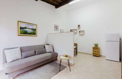 Palmas Arborea Maison | Maison de vacances 'Il Corbezzolo Apartment' avec terrasse partagée, Wi-Fi et climatisation