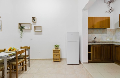 Palmas Arborea Maison | Maison de vacances 'Il Corbezzolo Apartment' avec terrasse partagée, Wi-Fi et climatisation