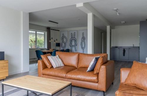 Offingawier Maison | Holiday Home in Sneek with Waterfront Jetty