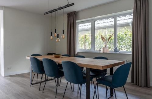 Offingawier Maison | Holiday Home in Sneek with Waterfront Jetty