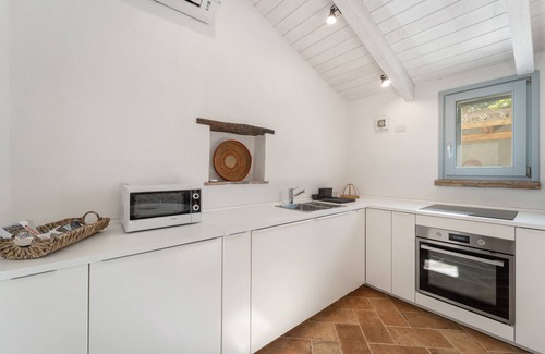 Giba Maison | Maison de vacances 'La Casetta' avec terrasse privée, Wi-Fi et climatisation