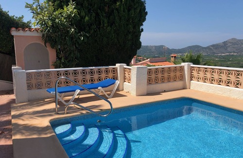 Orba Maison | Maison de vacances - un oasis paisible avec vue sur les montagnes et la mer