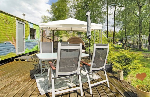 Detern Maison | Maison de vacances 'Süßes Häuschen Am See' avec terrasse privée et jardin privé