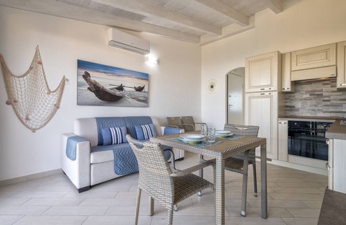 Paduledda Maison | Maison de vacances 'Sky View' avec vue sur la mer, piscine partagée et climatisation
