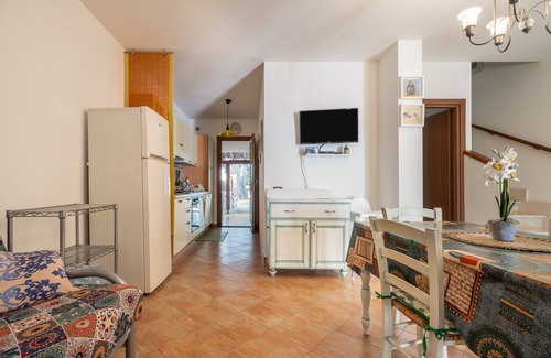 Porto Pino Maison | Maison de vacances 'Sole E Mare' avec terrasse privée, jardin privé et climatisation