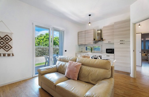 Arona Maison | Maison de vacances 'Villa Lilia Appartamento Verde' avec jardin partagé et Wi-Fi