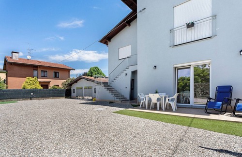 Arona Maison | Maison de vacances 'Villa Lilia Appartamento Verde' avec jardin partagé et Wi-Fi