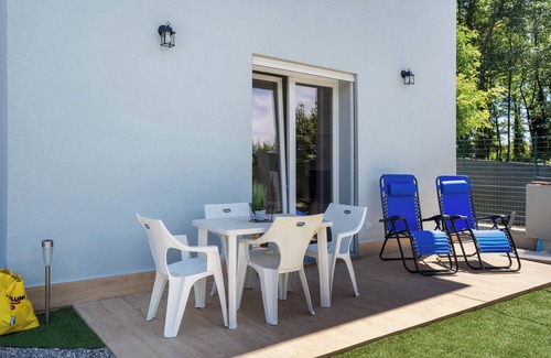 Arona Maison | Maison de vacances 'Villa Lilia Appartamento Verde' avec jardin partagé et Wi-Fi