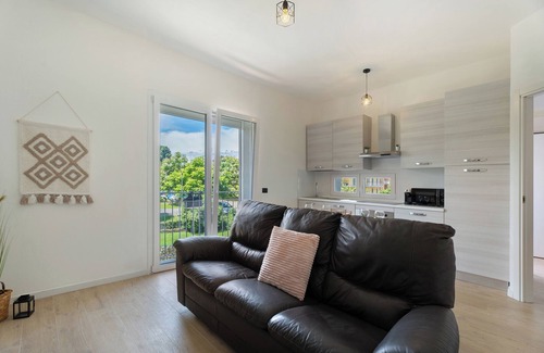 Arona Maison | Maison de vacances 'Villa Lilia Appartamento Blu' avec jardin partagé, balcon et Wi-Fi