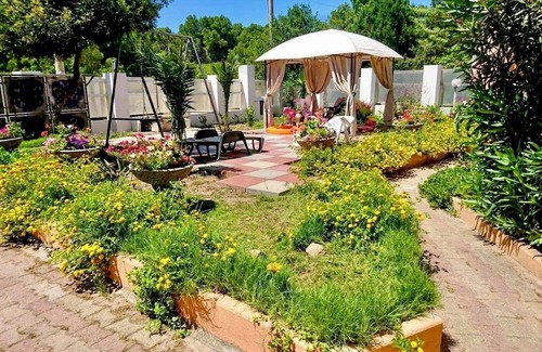 Porto Pino Maison | Maison de vacances 'Villa Mimosa' avec terrasse privée, jardin privé et climatisation