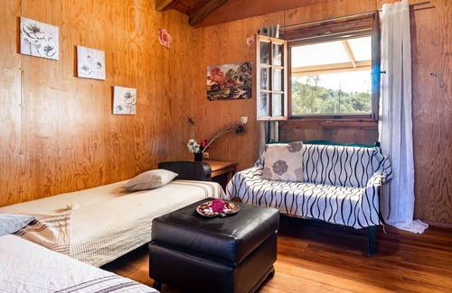 Paliki Maison | Maison de vacances "Maison en bois" avec vue sur les montagnes et jardin.