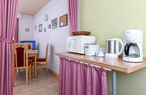 Esens Maison | Maison de vacances Bensersiel pour 1 - 4 personnes avec 2 chambres à coucher - Maison mitoyenne