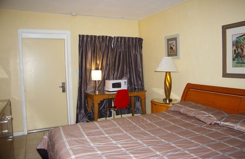 Mango Groves Hôtel | Holiday House Motel