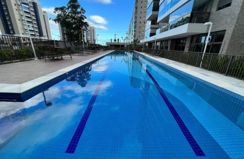 Vila Clais Maison | Home 49 I Apto pé na areia e piscina aquecida em Bertioga