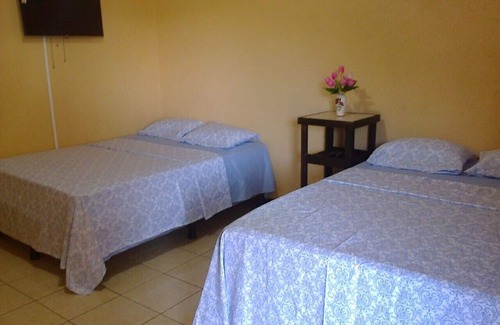La Cruz Maison | Comme à la maison! Hôtel confortable, propre et sûr à quelques minutes de la belle plage !!