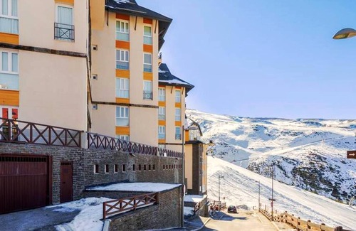 Pradollano Appartement | Homerez - Superbe appartement pour 5 pers. avec piscine partagée à Sierra Nevada