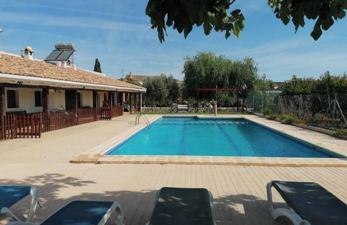 Caravaca de la Cruz Appartement | Homerez - Appartement charmant à Noguericas avec piscine partagée