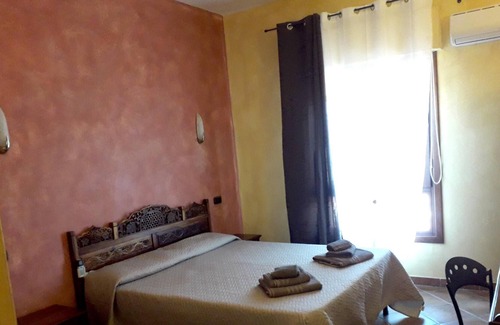 Gonnesa Appartement | Homerez - Appartement à 4 km de la plage pour 6 pers. avec piscine partagée