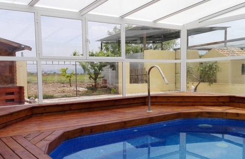 Caravaca de la Cruz Appartement | Homerez - Appartement pour 4 pers. avec piscine partagée et jacuzzi à Noguericas
