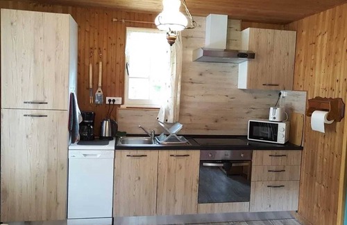 Vaas Chalet De Ski | Homerez - Cozy Chalet in Vaas with Lake View