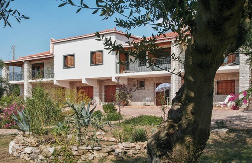 Skafidia Appartement | Homerez - Appartement élégant à Agios Ilias, vue mer