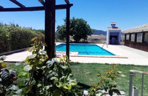 Caravaca de la Cruz Maison | Homerez - Maison pour 8 pers. avec piscine partagée et jacuzzi à Noguericas