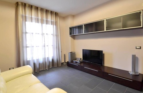 Vercelli Appartement | Homerez - Joli appartement pour 3 pers. avec jardin et terrasse à Vercelli
