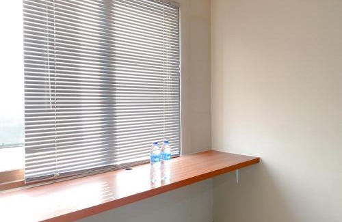 Jakarta Appartement | Homey and Minimalist Studio Gateway Park LRT City Jatibening Apartment By Travelio
