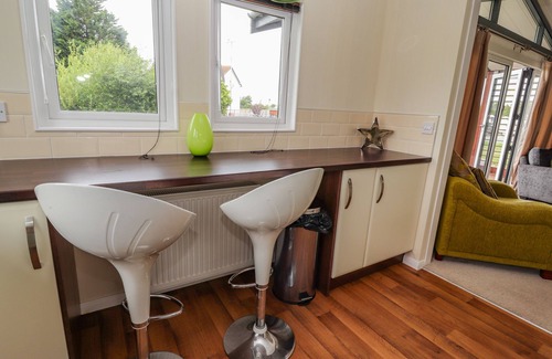 Kinmel Bay Cottage | HONEYSUCKLE LODGE, pet friendly, character holiday cottage in Towyn