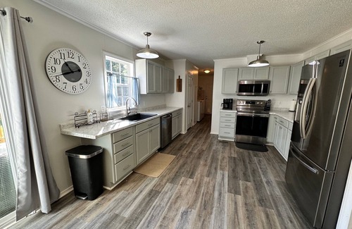 Newport Maison | Hot Tub, Pet Friendly, 3 miles to Emerald Isle, fully fenced yard.