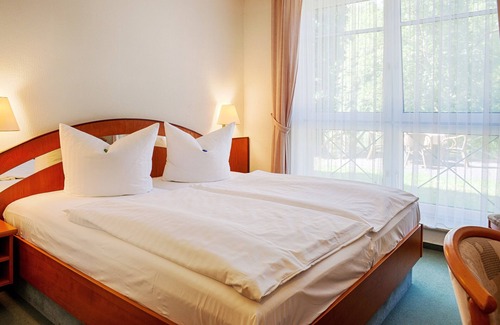 Karnin Hôtel | Hotel Carmina am See